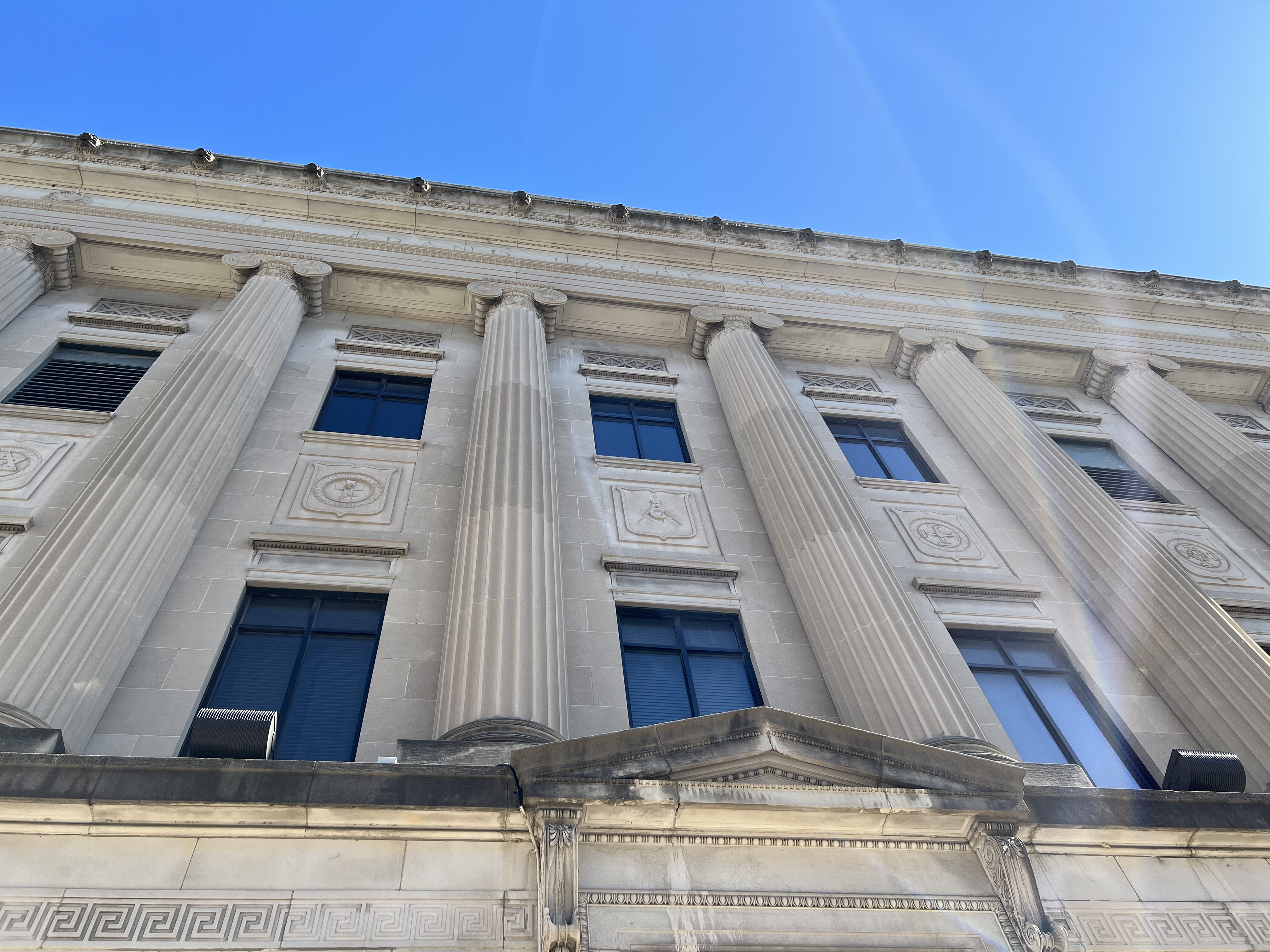 Facade detail with carved Masonic medallion