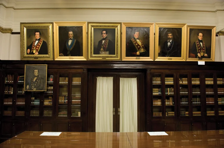The library at the Grand Lodge of Tennessee, with portraits of Past Grand Masters above the bookcases